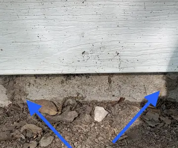 Spotting termite damage around a home foundation